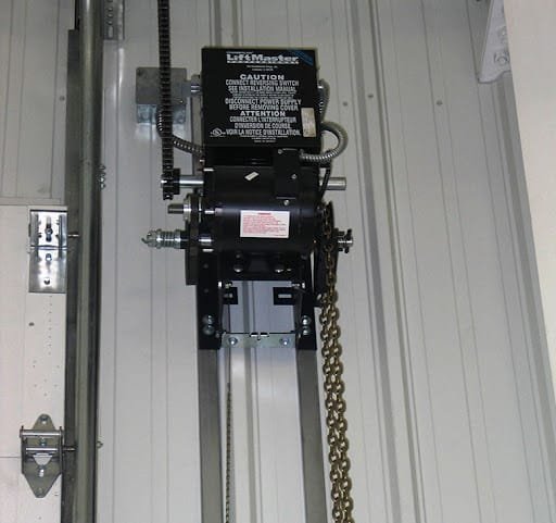 Wall-mounted LiftMaster commercial door operator with manual chain